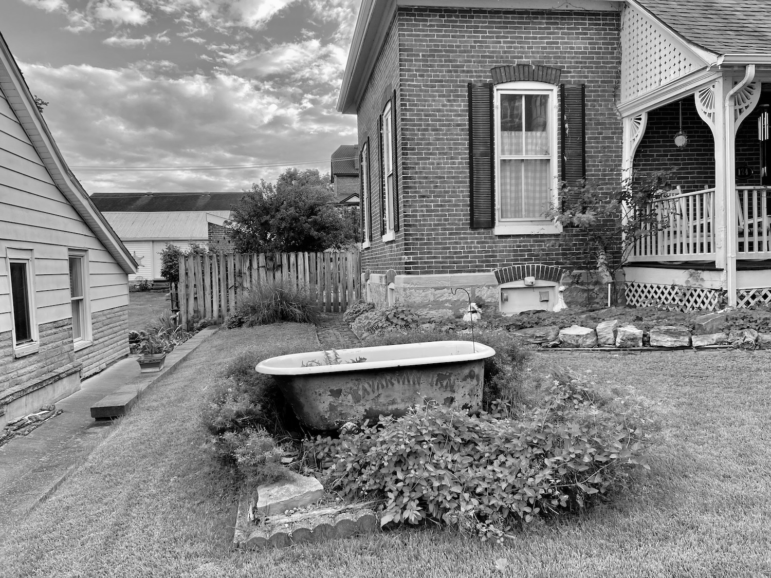 Black and white photograph by Keith Davis of a Bathtub on a lawn in Hermann MO 2022