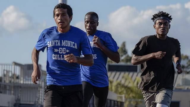 Three Students running