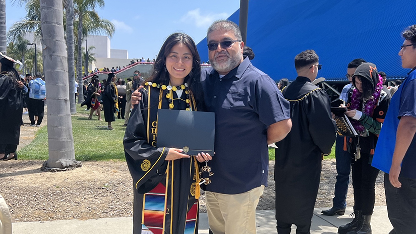 Jose with former student Gabby Ruiz at CSULB graduation