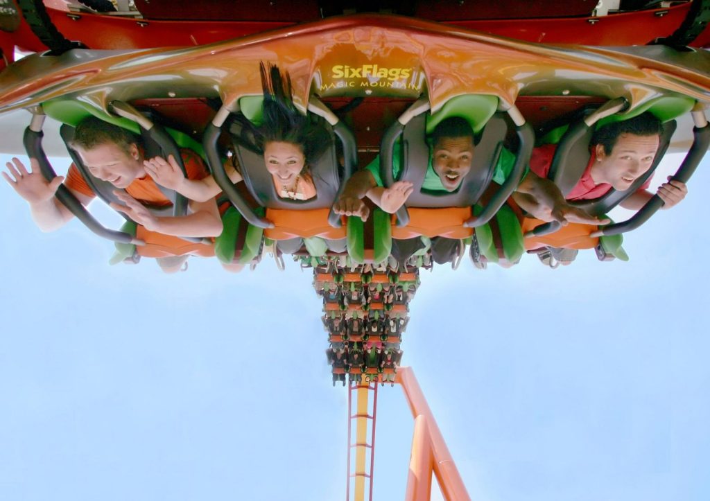 People upside down on a rollercoaster