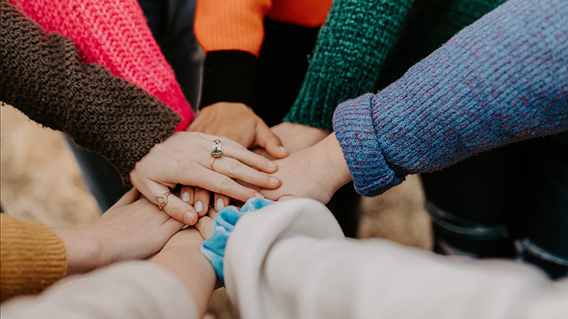 Hands gathered together